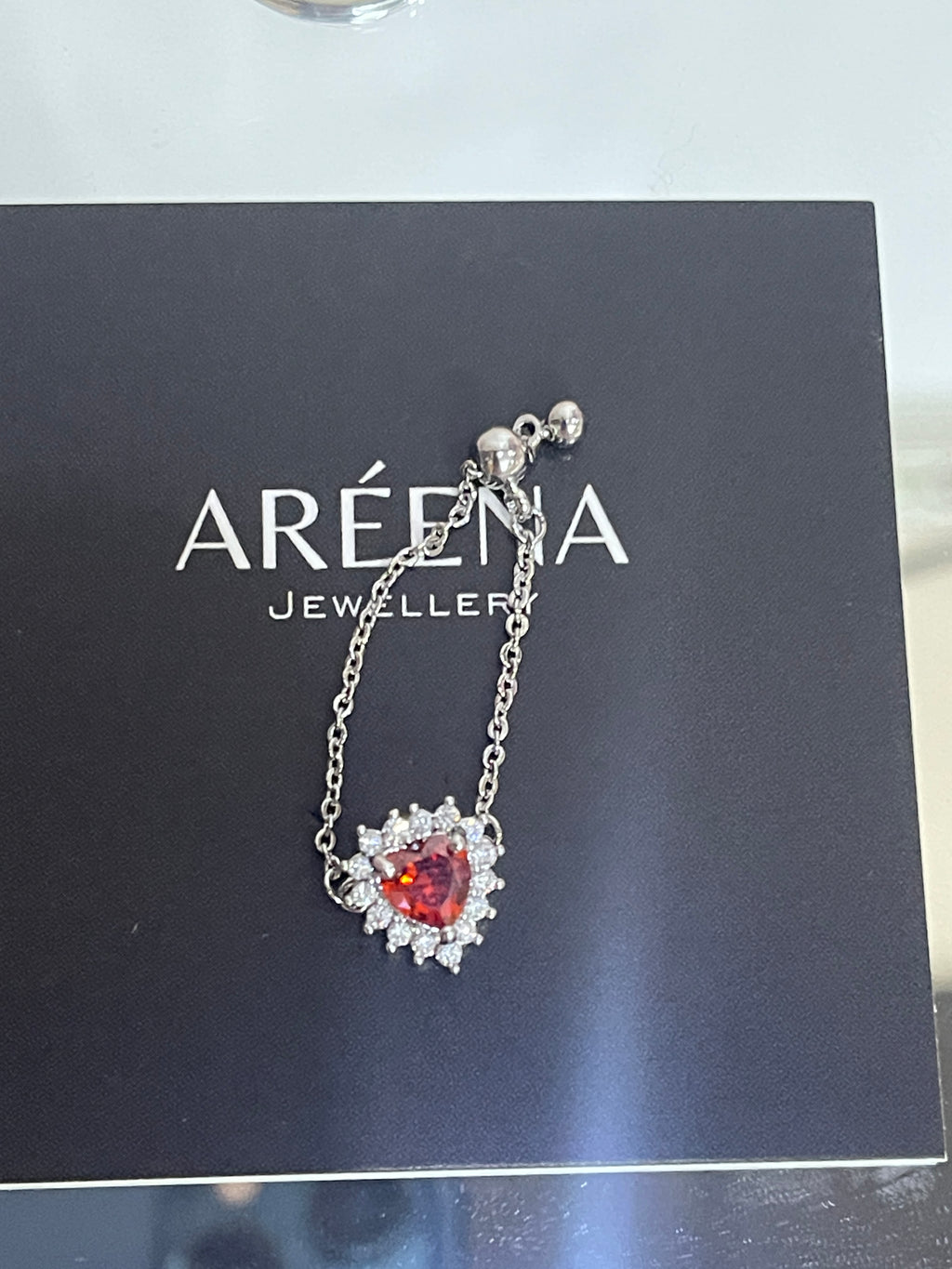 Red Sovereign Adjustable Heart Shaped Chain Ring - Silver Chain