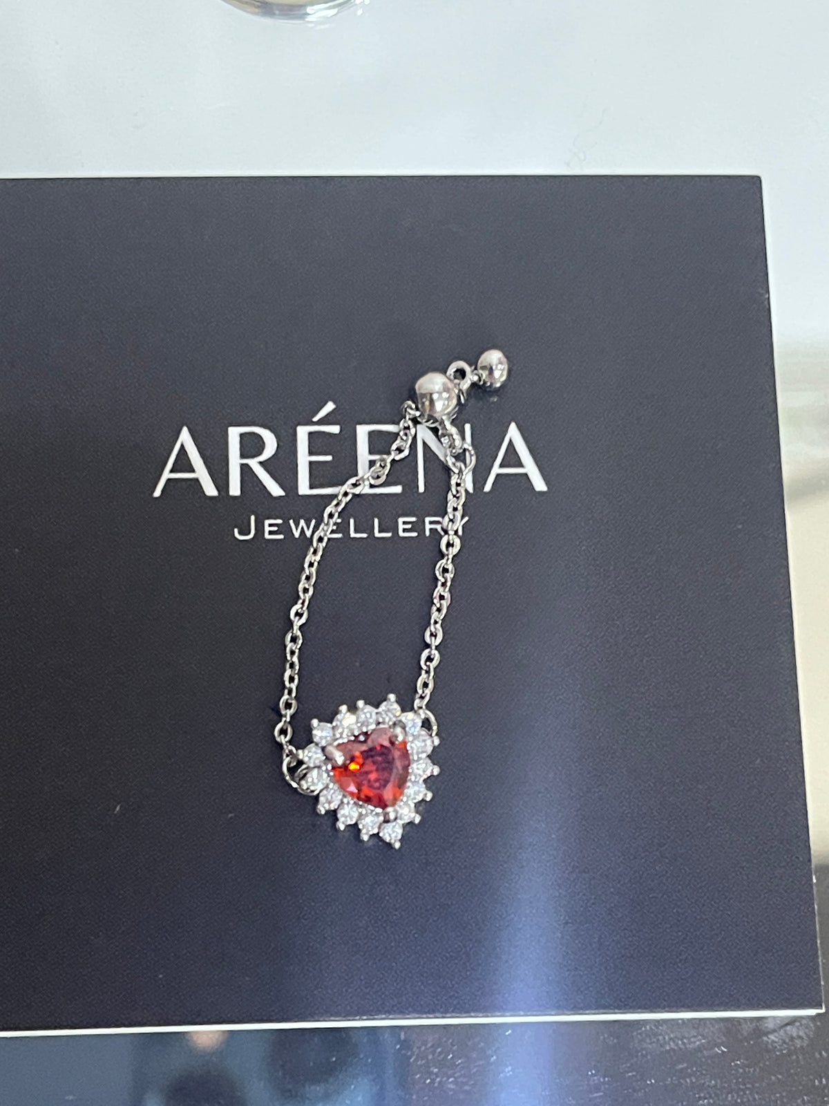Red Sovereign Adjustable Heart Shaped Chain Ring - Silver Chain