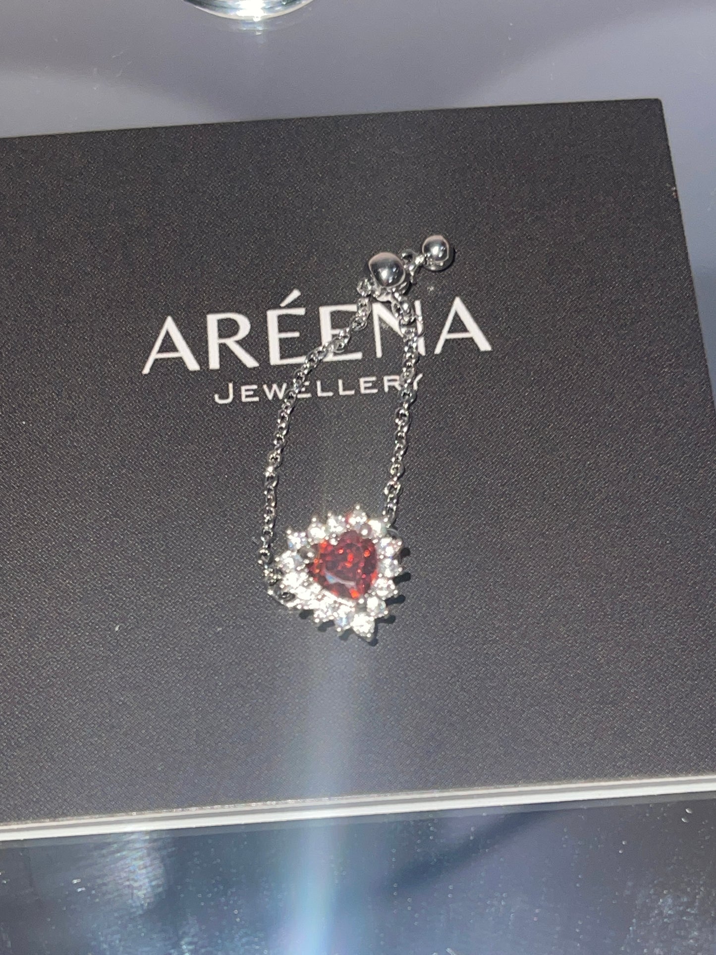 Red Sovereign Adjustable Heart Shaped Chain Ring - Silver Chain